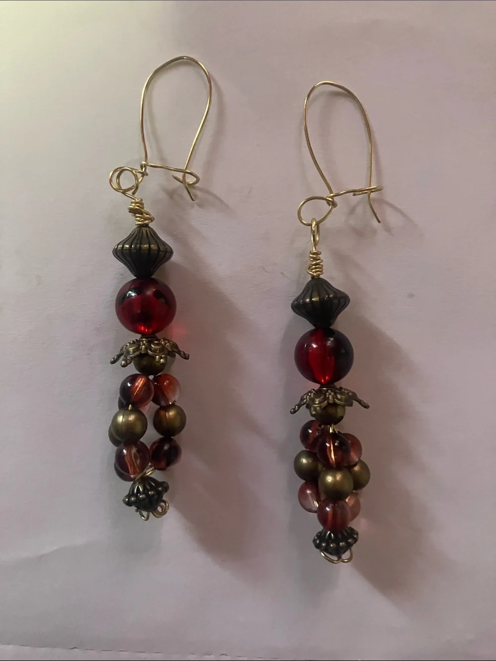 Handcrafted upcycled vintage long wire pierced red and bronze bead earrings - Picture 1 of 5